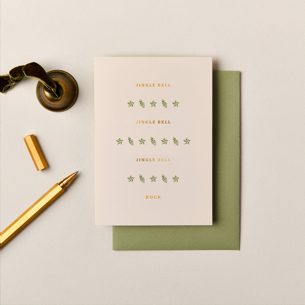 Jingle Bell Rock Christmas card with gold foil lettering and olive green baubles