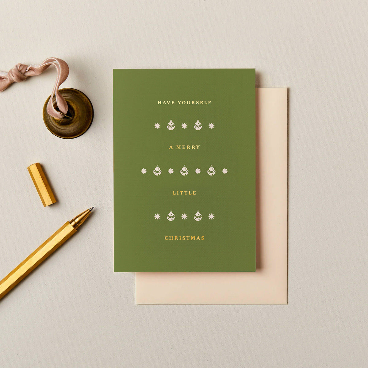 Olive green Merry Little Christmas card with metallic foil lettering and bauble details