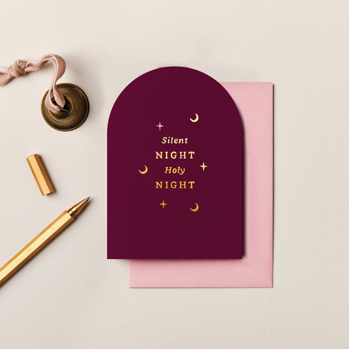 Burgundy arched Silent Night Christmas card with gold foil moon and star details