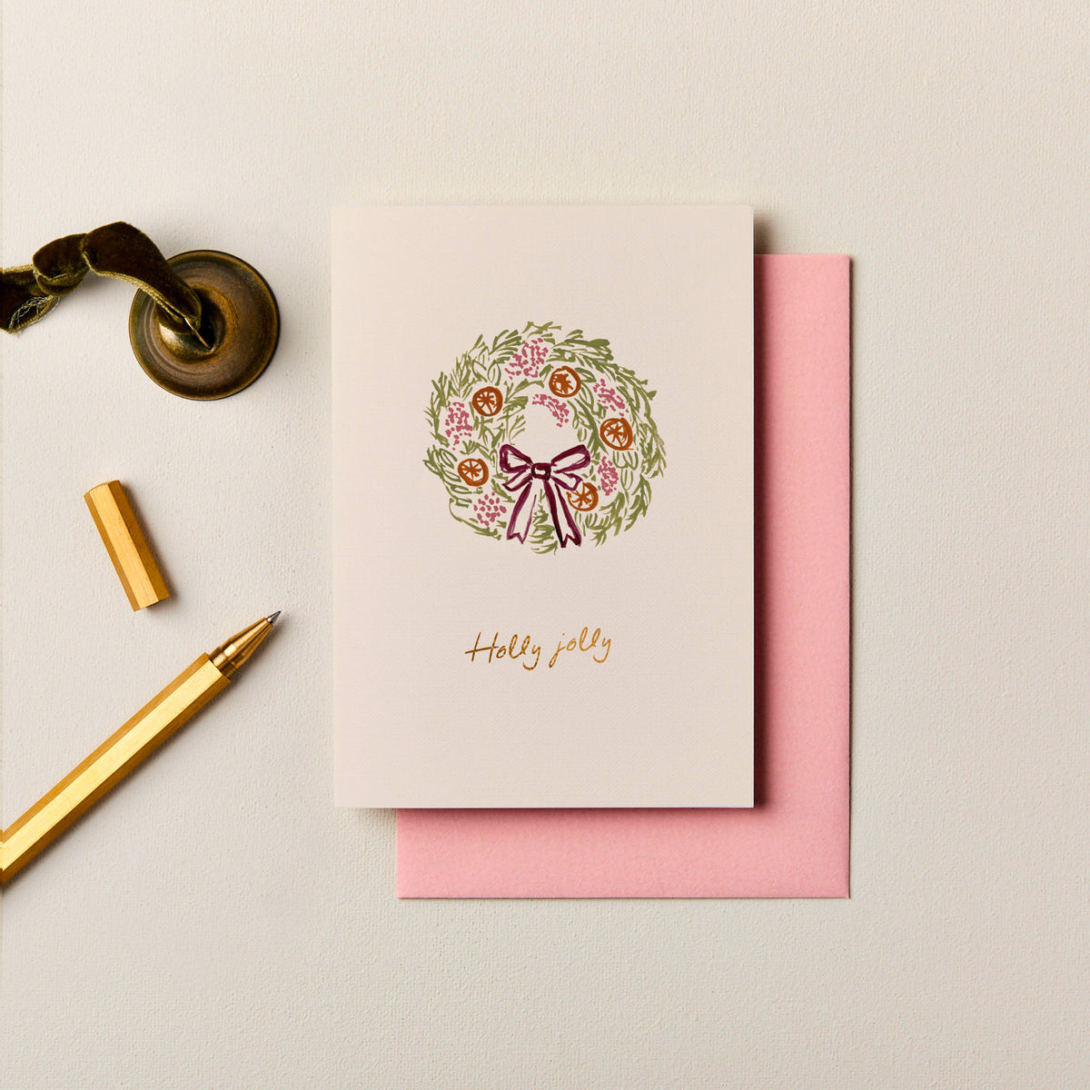 Hand painted Christmas wreath card with pink berries burgundy bow and gold foil Holly Jolly text