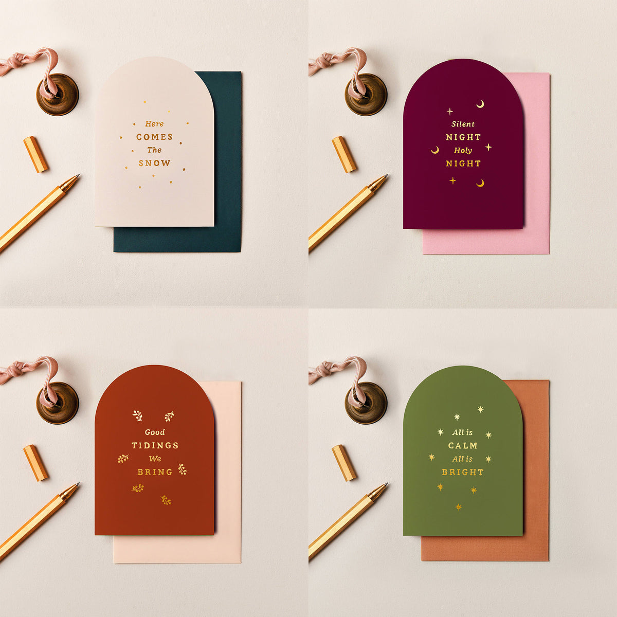 Pack of four arched gold foil Christmas cards in cream burgundy rust and olive green
